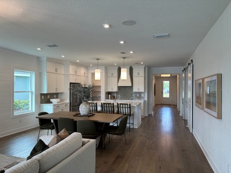 Cardel Homes White Kitchen Living and Dining Model Home Elevation North River Ranch